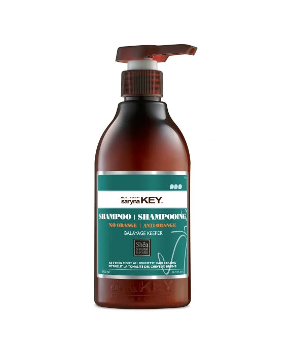 Saryna Key No Orange Shampoo Balayage Keeper cu pigmenti albastri si unt de shea african. Neutralizeaza tonurile calde pentru par blond, decolorat si cu suvite. 300ml.